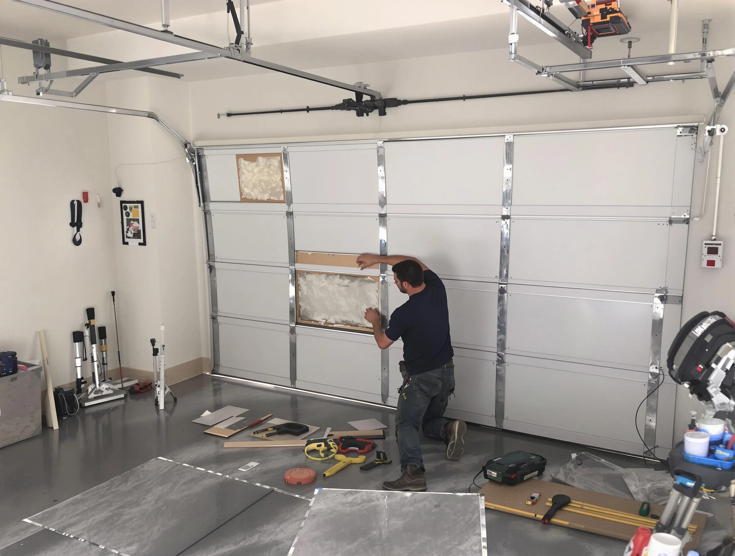 Garage Door Panel Repair in Littleton